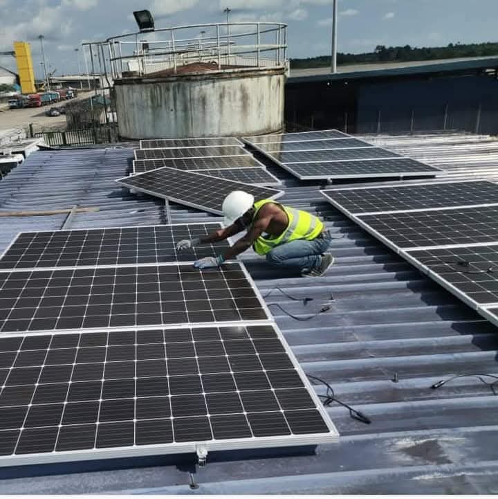 Engineer performing solar maintenance